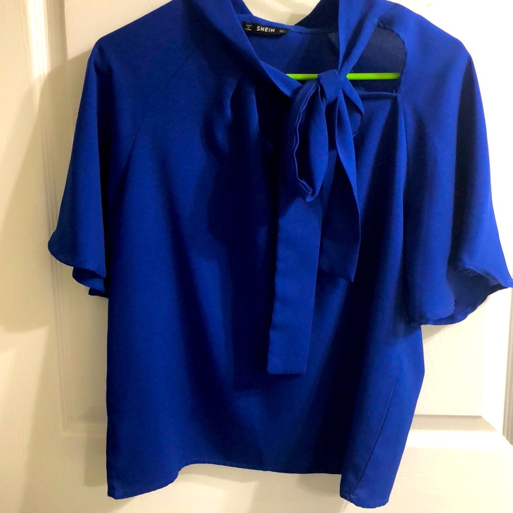 Beautiful blue business top with the best float sleeves